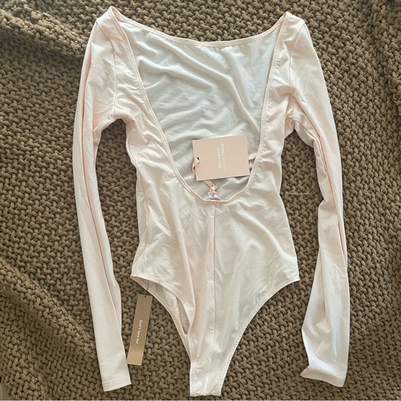 NWT light pink Reformation high-neck, open back body suit in size XS/0 - Picture 2 of 2